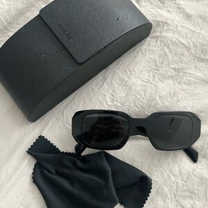 Prada Elegant Black Sunglasses for Women